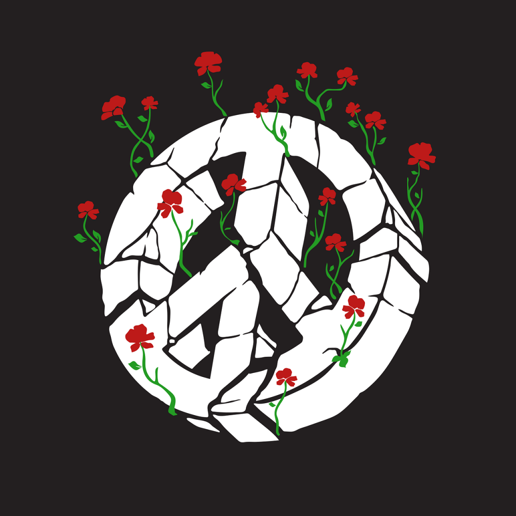 A Peace sign crumbling away with red roses growing among the cracks